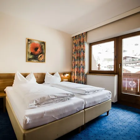 Dorfplatzl Garni & Apartmanhotel Tux