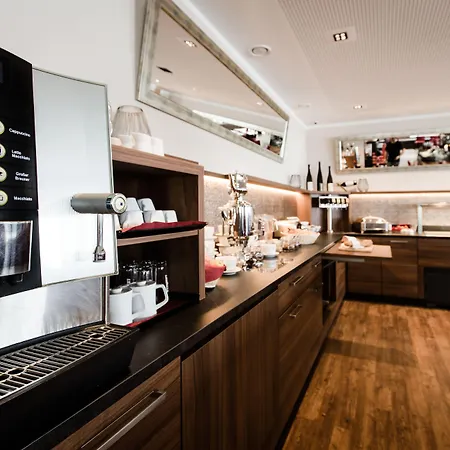 Dorfplatzl Garni & Apartmanhotel Tux