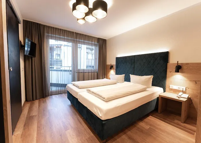 Dorfplatzl Garni & Apartahotel 4*